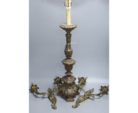 A pair of rococo style twin light wall sconces, and an Italian period style giltwood table lamp, height 56cm