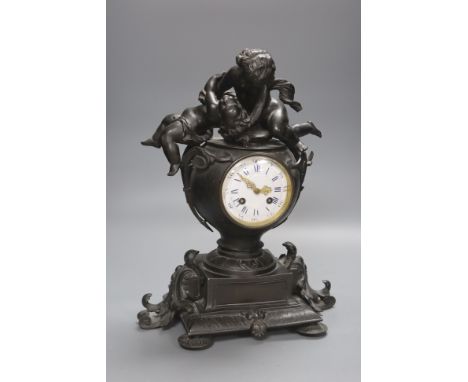 A Victorian spelter 'cherub' mantel clock, height 39cm