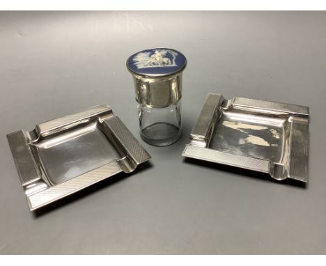 A pair of modern part engine turned silver ashtrays, 95 mm, 176 g and a silver and Wedgwood plaque mounted salt glass salts b