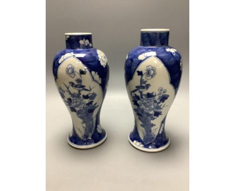 A pair of Chinese blue and white vases, Kangxi mark c.1900, height 22.5cm