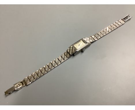 A lady's 1960's 9ct white gold Clear manual wind cocktail wrist watch, on a 9ct white gold bracelet, overall 17cm,gross weigh