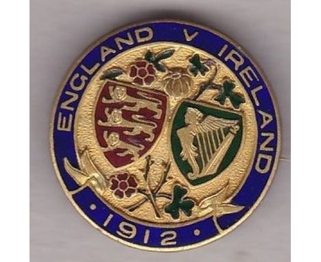 ENGLAND v IRELAND 1912    Gold and enamel badge inscribed on rim England v Ireland 1912 with Three Lions and Irish Harp on th