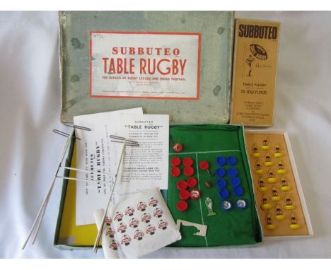SUBBUTEO       A box of Table Rugby which appears to be complete. The box is worn and has tape around the edges. Plus a box o