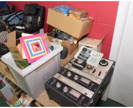 An Akai M8 reel to reel recorder in full working order; tog. with speakers, microphone, reels and all other accessories.