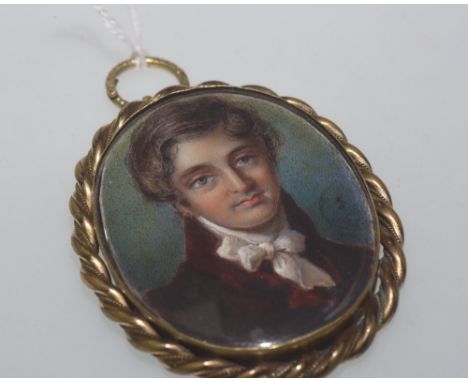 A 19th century portrait miniature of a gentleman on ivory in gilt metal frame with an attractive agate back, 7cm by 5.5cm inc