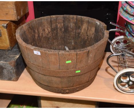 A coopered wooden planter