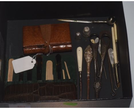 A Vintage  green crocodile skin manicure set together with a Mappin & Webb leather sewing kit, two thimbles, and collection o