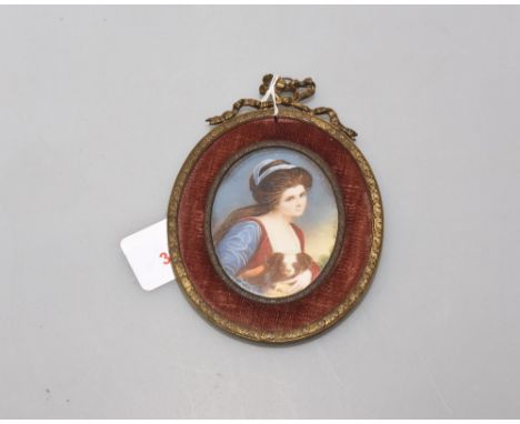 A portrait miniature on ivory of a lady and dog