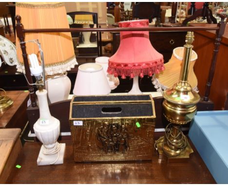 An alabaster table lamp, a brass table lamp and a brass magazine rack (3)