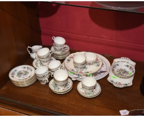 An Aynsley Pembroke pattern china tea service for twelve, comprising cups, saucers, plates, two dishes, a milk jug, a sugar b