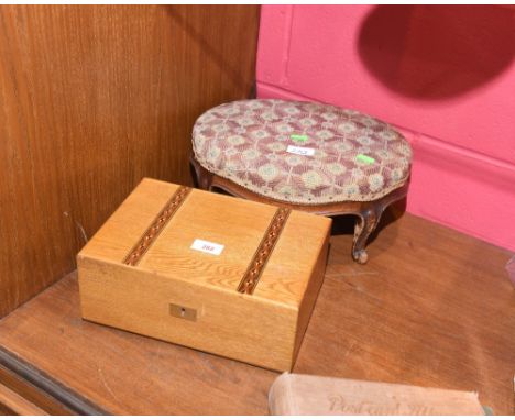 A small Victorian footstool with tapestry seat and shaped moulded legs, together with a marquetry banded box