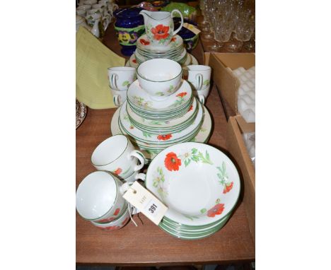 A modern Royal Worcester 'Poppy' pattern part dinner and tea service.