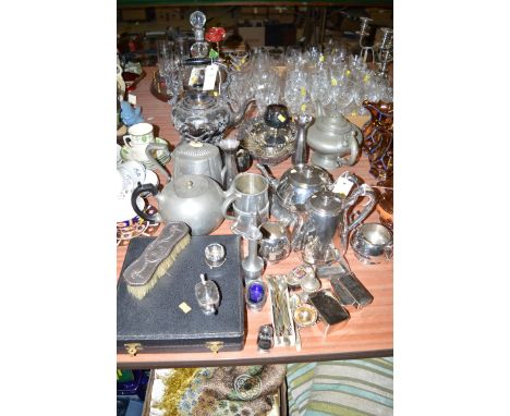 A quantity of silver plated ware, including a Victorian spirit kettle-on-stand; a modern four-piece silver plated tea set; a 