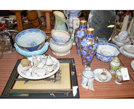 A pair of blue vases with gilt decoration; a Chinese Famille Rose decorated bowl; crested china; a pair of small lidded vases