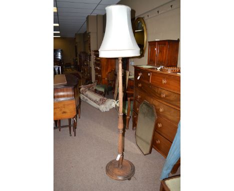 A standard lamp and shade.