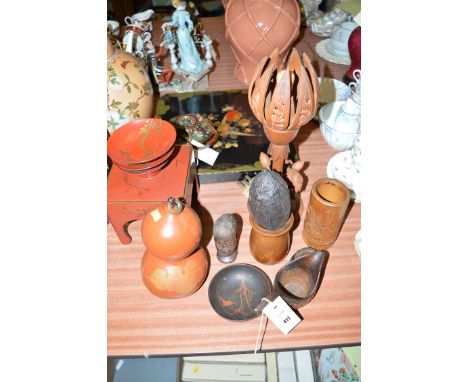 A squat cloisonne teapot; a red lacquered box; and three dishes; a lacquered florally decorated table top and shelf; a wooden