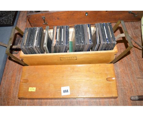 A box of glass magic lantern slides.