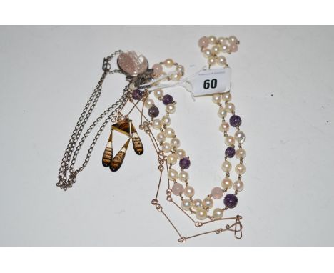 A rock crystal set pendant in white metal on chain; a banded agate yellow metal set drop pendant; and a cultured pearl and ca