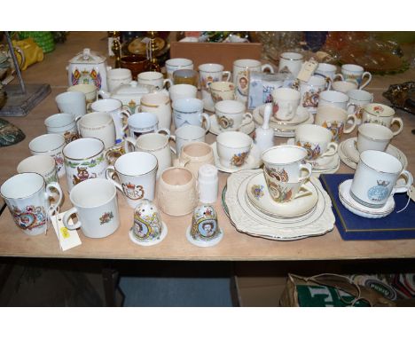 A large quantity of miscellaneous commemorative china; tea cups; mugs; etc.