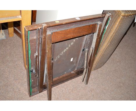 A 1930's folding card table.