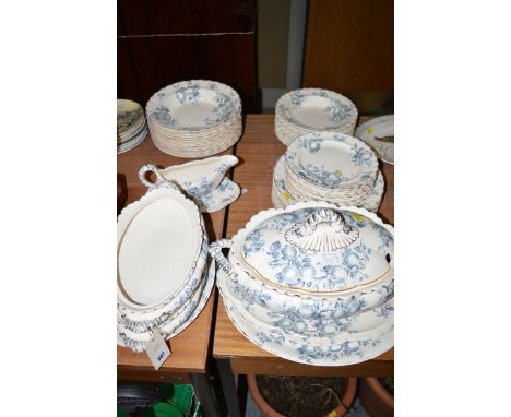 A 19th Century blue and white dinner service in 'Apples' pattern, by K. & V.B., ten plus place settings, including two tureen