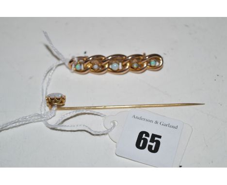 An opal oval link bar brooch; together with an opal set tie pin on yellow metal stick.  (2)