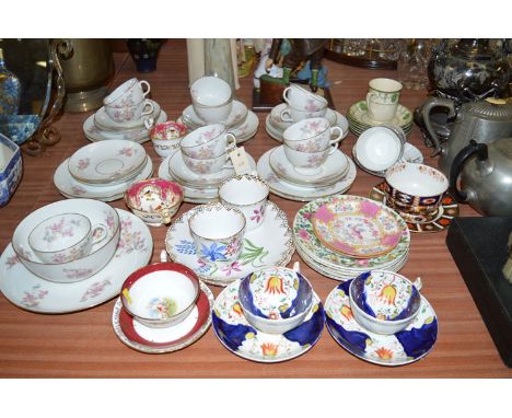 A French florally decorated tea service; a Crown Derby small plate and bowl; assorted cups and saucer; etc.