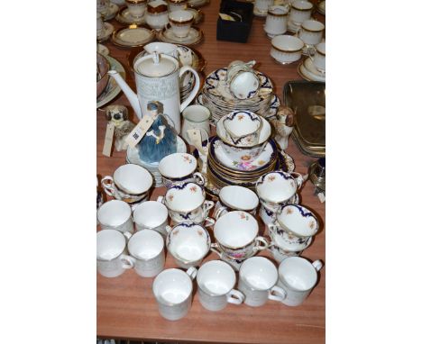 A Royal Doulton figurine 'Cherie'; a pair of Staffordshire pottery poodles; a Victorian 'Diamond' china tea service; together