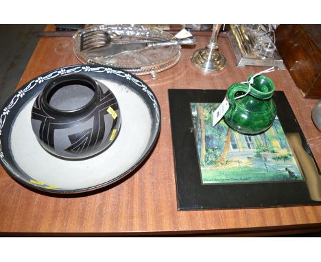 A Quay West art tile depicting Ernest Hemingway's House; a green Art pottery jug; a black bowl by Tomasa Mora; together with 