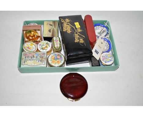 A collection of modern enamelled patch boxes; a travelling alarm clock; a powder compact; etc.