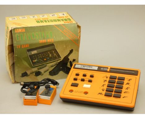A boxed Adman Grandstand 3600 MK II, with two controllers and a thundercolt super marksman 304 light gun, together with a Bin