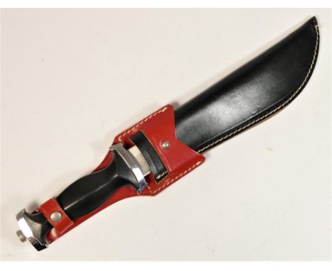 A Whitby Bowie type knife, the 20cm blade stamped Solingen, Germany, the other side etched Long John Silver, chrome guard and