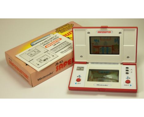 A Nintendo Pocketsize Game and Watch (Safe Buster) multiscreen handheld game c.1988 (serial number 43685746) In original box 