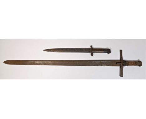 A 19th&nbsp; century Sudanese kaskara, the 72 cm fullered blade with crescent moon stamping, separate guard,&nbsp;wood grip, 