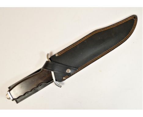 A fixed blade hunting knife, the 27.5cm blade, stamped stainless, Taiwan, serrated point and three holes, hardwood handle, le
