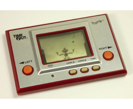 A Nintendo Time Out (Toss-up) handheld game c.1980 (serial number 00030807) Time out was the first of Nintendo's Game and Wat