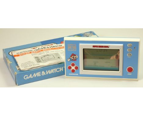 A Nintendo Game and Watch (Super Mario Bros.) single/wide screen handheld game c.1988 (serial number 24886342) In original bo