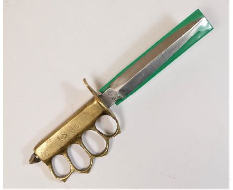 A trench fighting knife/knuckle duster, the hilt stamped U.S.1918, the 16.6cm blade stamped AU LION. This bladed product is n