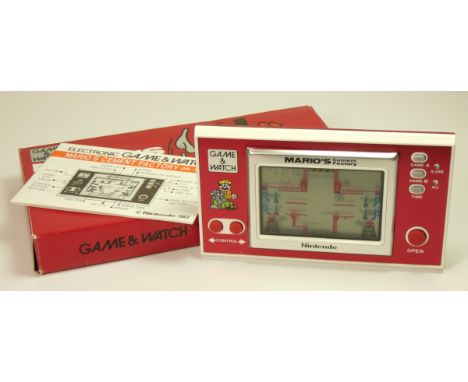 A Nintendo Game and Watch (Mario's Cement Factory) single/wide screen handheld game c.1983 (serial number 21420103) In origin