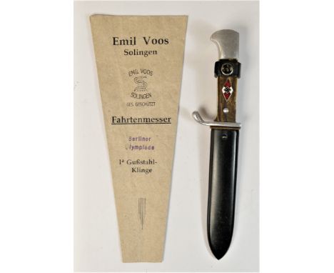 A rare Olympic Hitler Youth Dagger and Paper Envelope, the 11.75cm blade by EMIL VOOS SOLINGEN etched ZUM RUHME DES SPORTS ZU