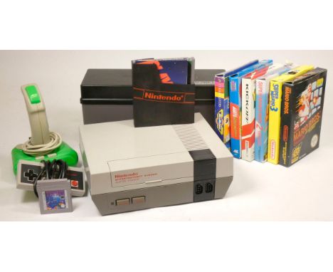 A Nintendo Entertainment System (Mattel version), with controller, AV and power cables, third party Zinger joystick, Nintendo