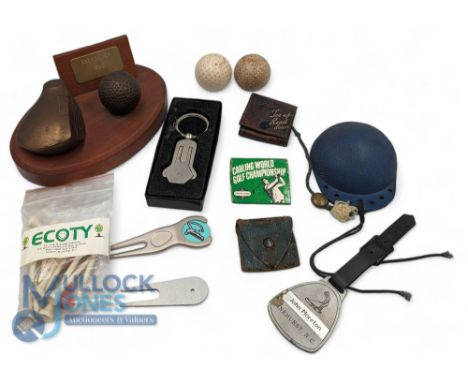 Golf Collectables: to include a rubber Britmarine golf ball cleaner, leather tee holders, 1990 Aberdovey trophy, Pinehurst fo