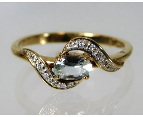 A 9ct gold topaz & diamond ring 2.1g size N