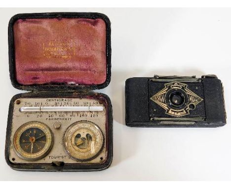 An Ensign Midget camera twinned with a French temperature gauge & compass in case