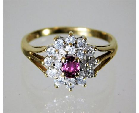 A 9ct gold ruby & diamond cluster ring 2.3g size L