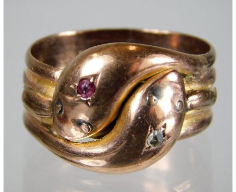 A 9ct rose gold double snake headed ring set with ruby & diamond 7.2g size T