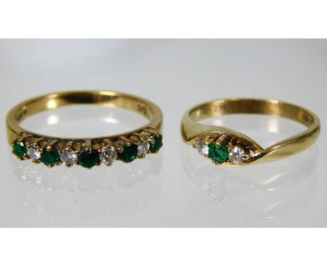 Two small 9ct emerald & diamond rings, the nine stone ring being size L & the three stone size G, combined weight 3.3g