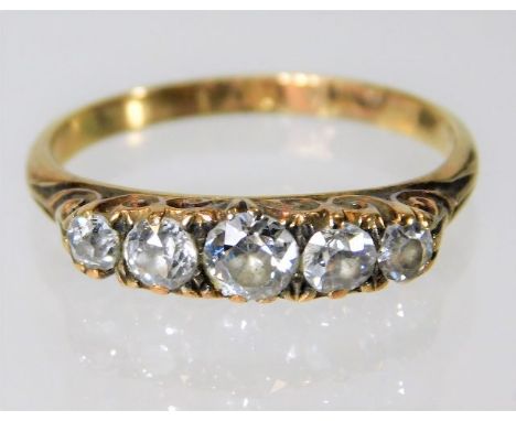 An 18ct gold & diamond five stone ring approx. 0.55ct diamond 2.4g size M