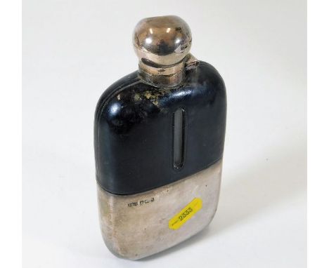 A James Dixon & Sons silver flask, dent to lid