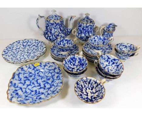 A 19thC. unusual twenty eight piece English flow blue & gilding tea service